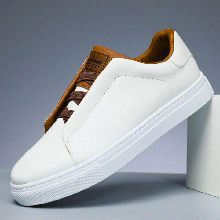 Low-top panelled sneaker with lace-up front and flat sole