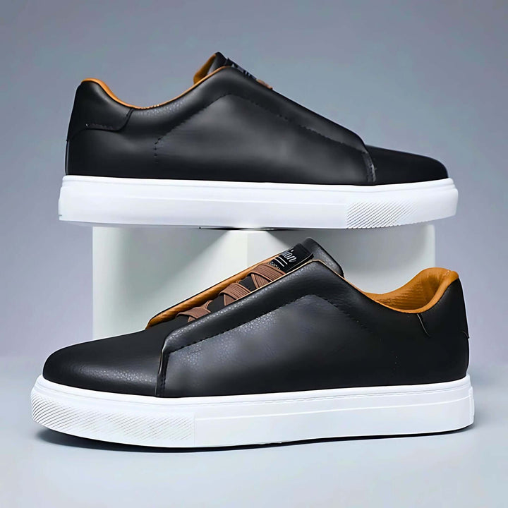 Low-top panelled sneaker with lace-up front and flat sole