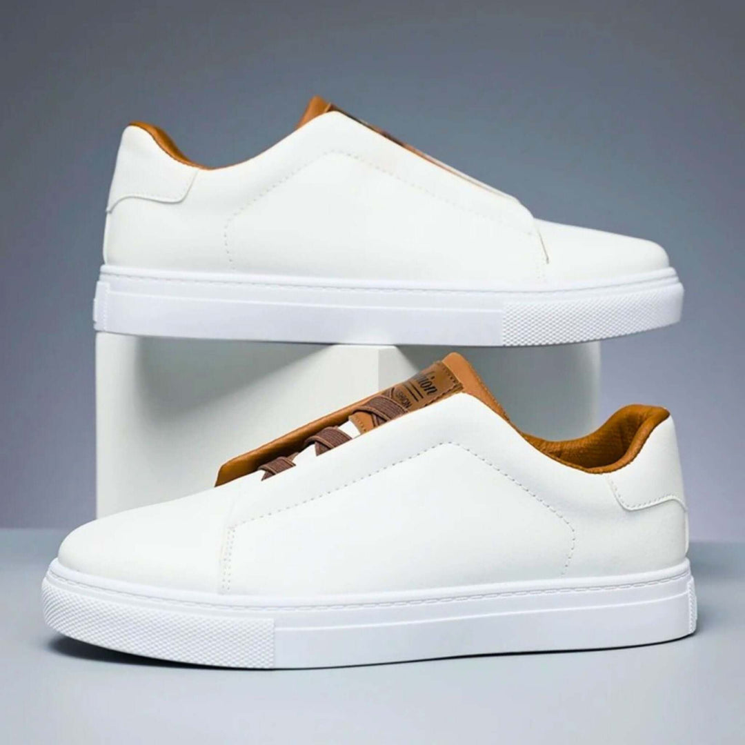 Low-top panelled sneaker with lace-up front and flat sole