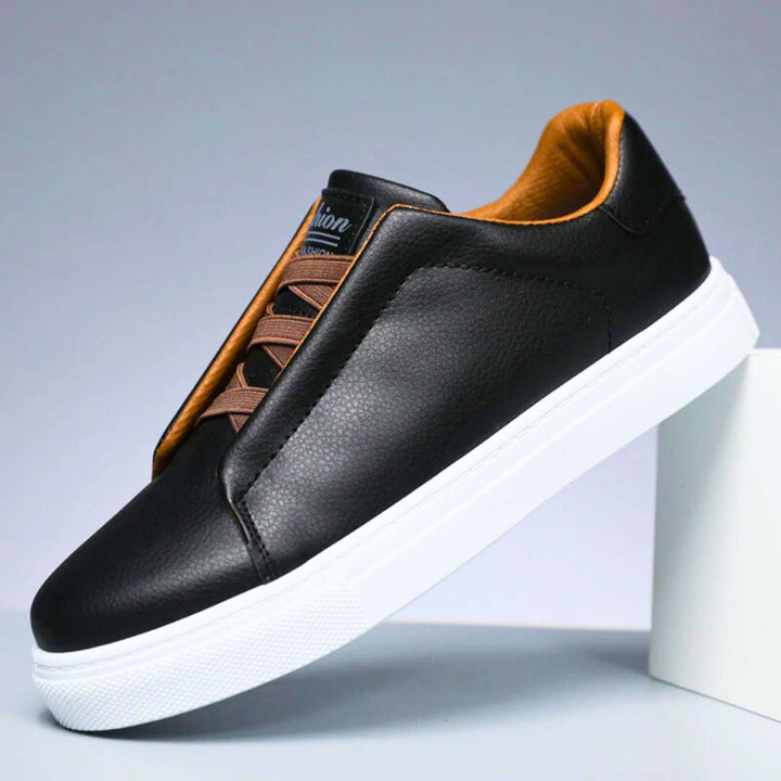 Low-top panelled sneaker with lace-up front and flat sole