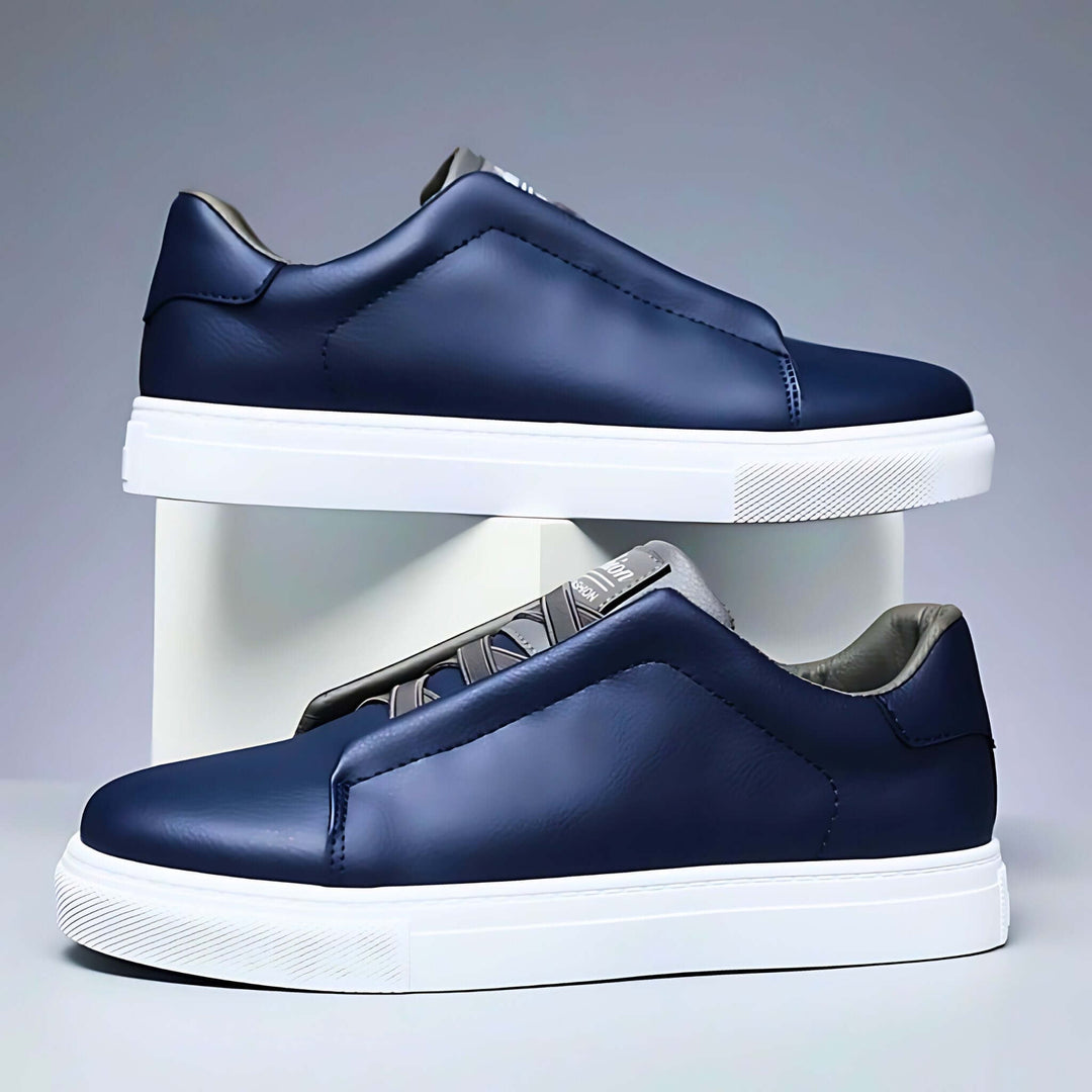 Low-top panelled sneaker with lace-up front and flat sole