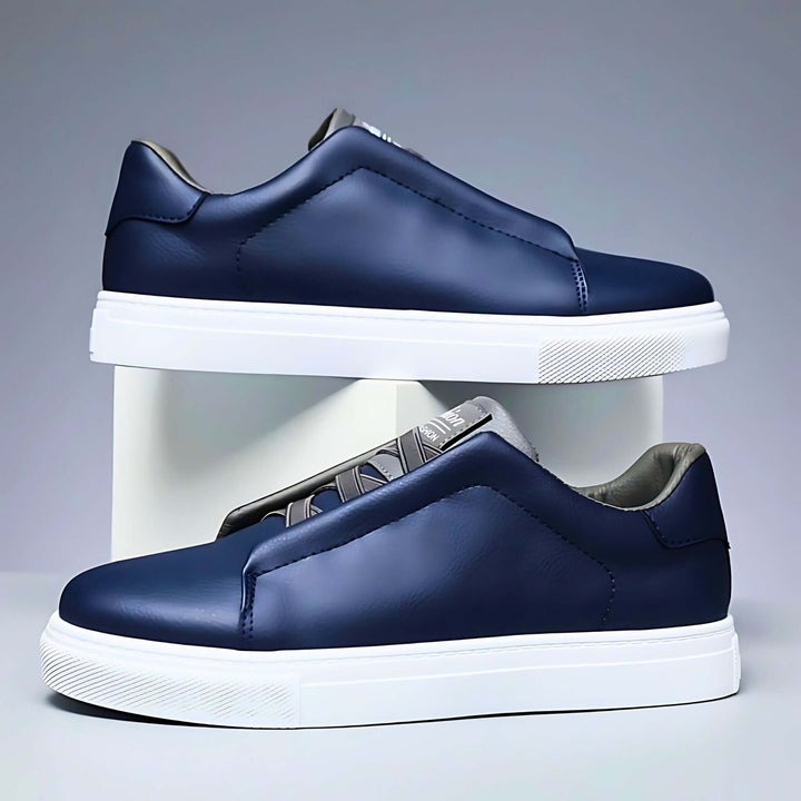 Low-top panelled sneaker with lace-up front and flat sole