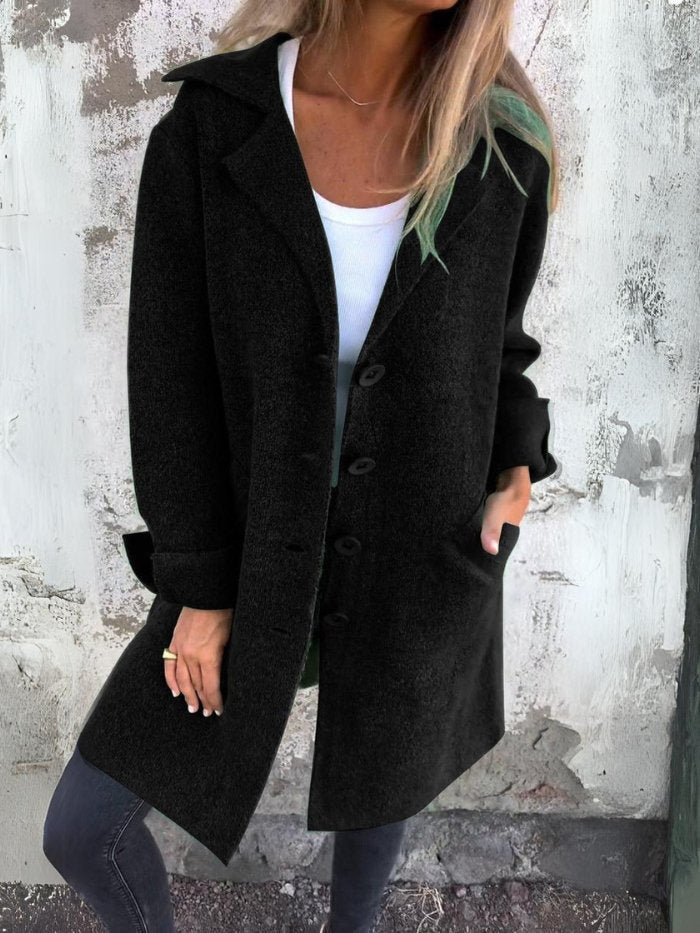 Women's longline button-front coat with lapel collar and long sleeves