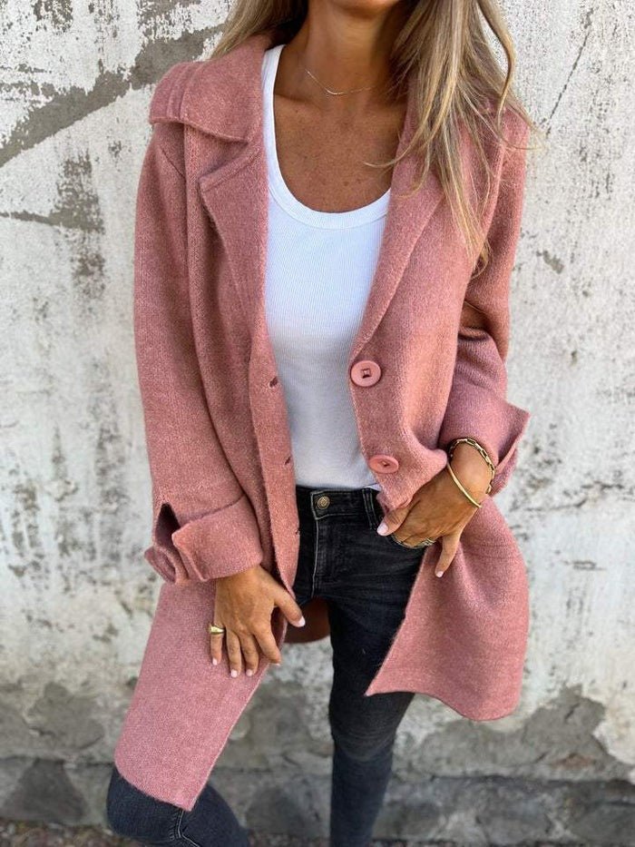 Women's longline button-front coat with lapel collar and long sleeves
