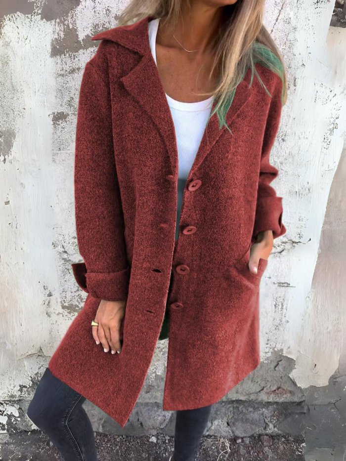 Women's longline button-front coat with lapel collar and long sleeves
