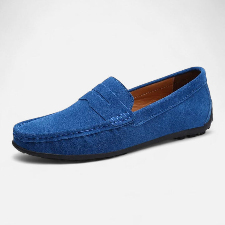 Men's slip-on penny loafer with moc toe stitching and flat sole