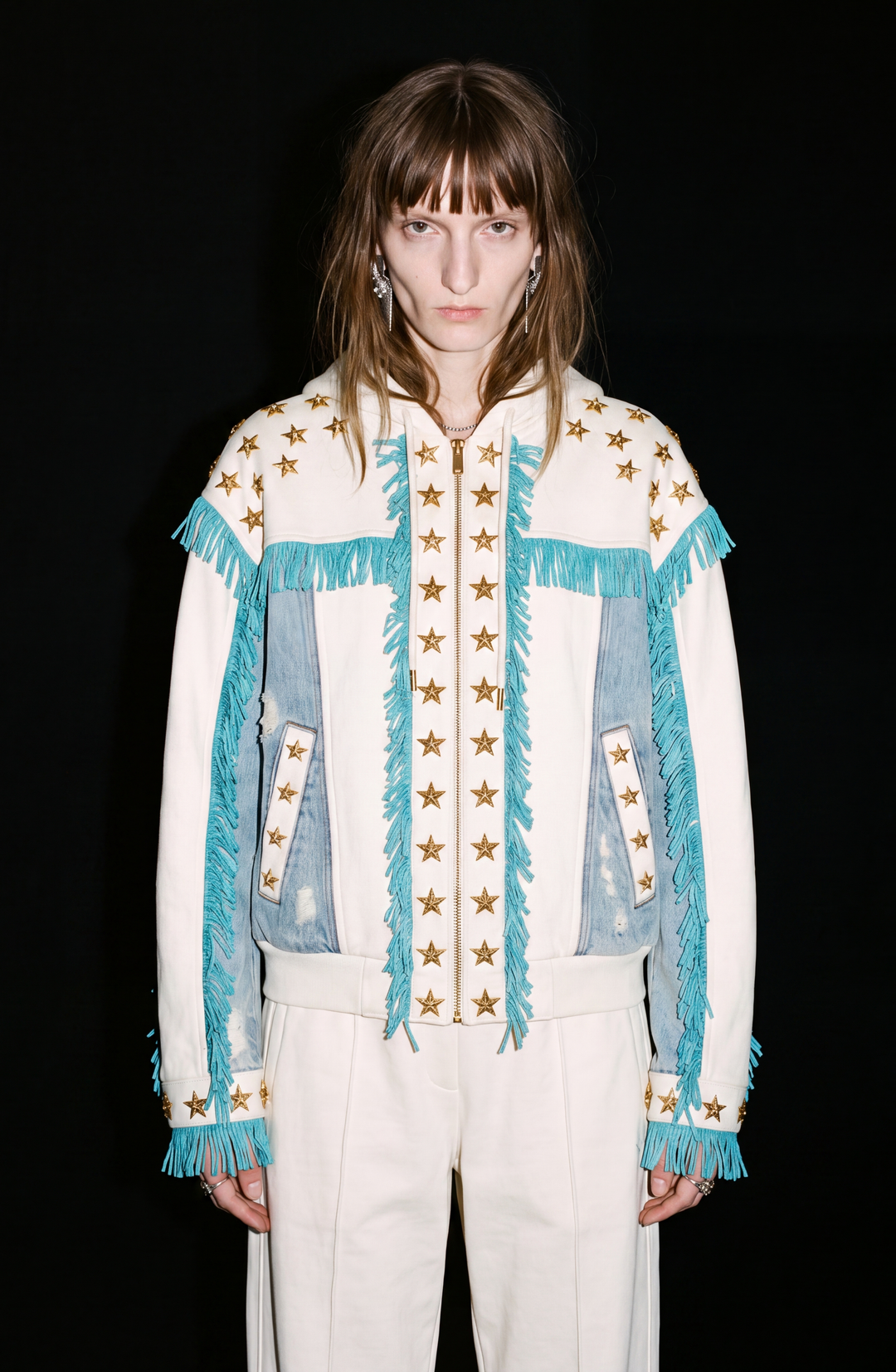 White hooded zip hoodie with gold stars, turquoise fringe and blue panels