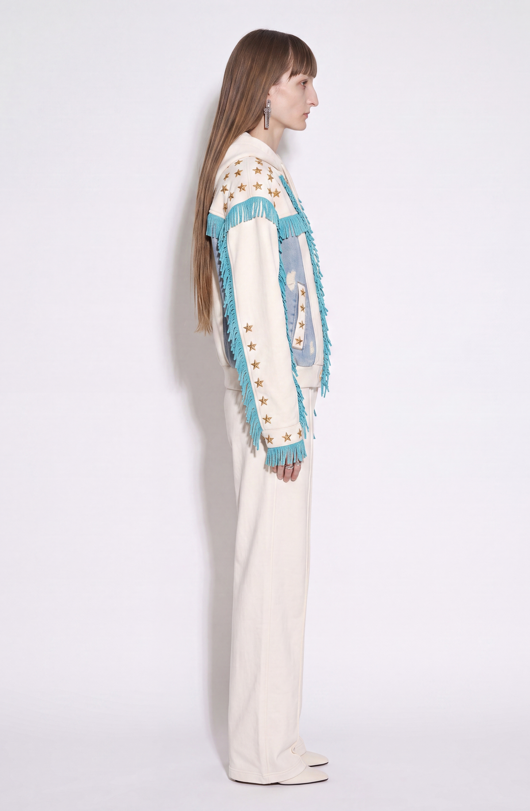 White hooded zip hoodie with gold stars, turquoise fringe and blue panels