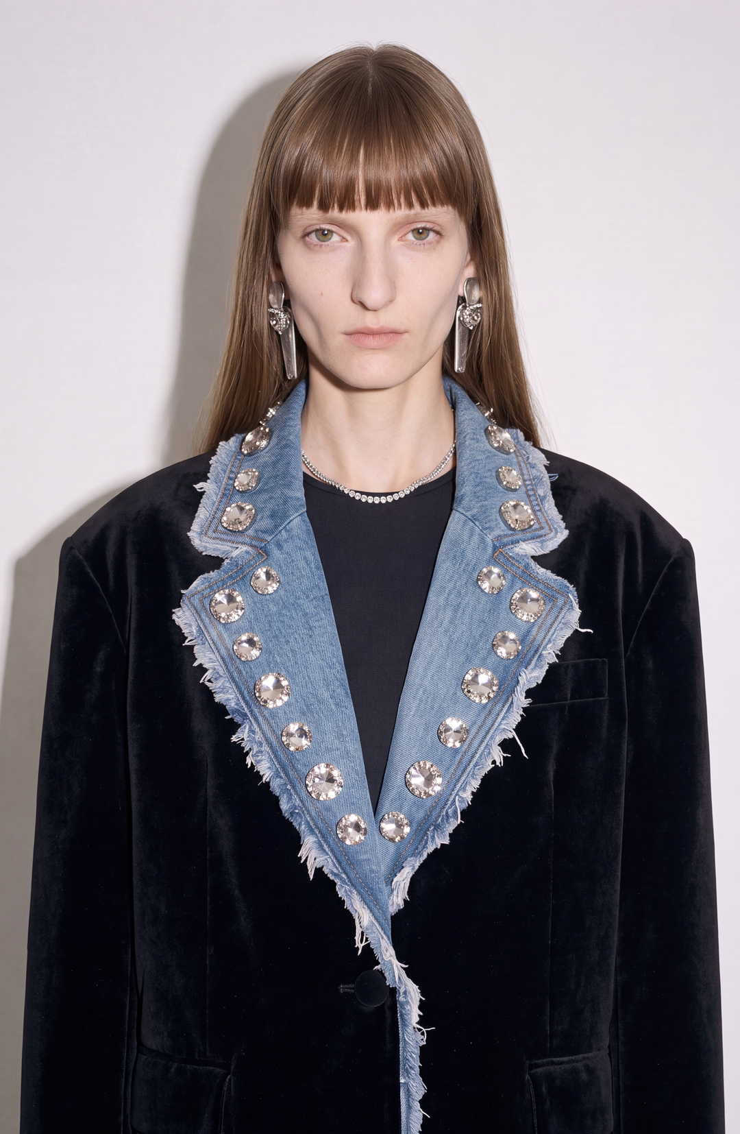 Black velvet blazer with blue denim lapels and crystal embellishments
