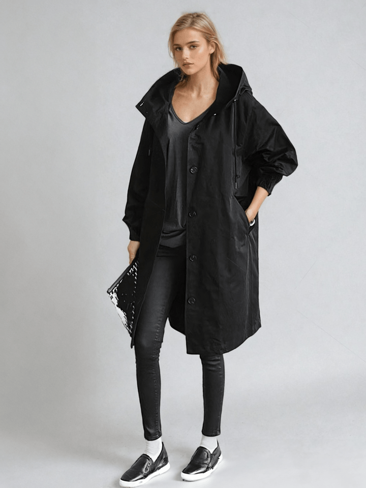 Women's hooded trench coat with buttons, long sleeves and side pockets