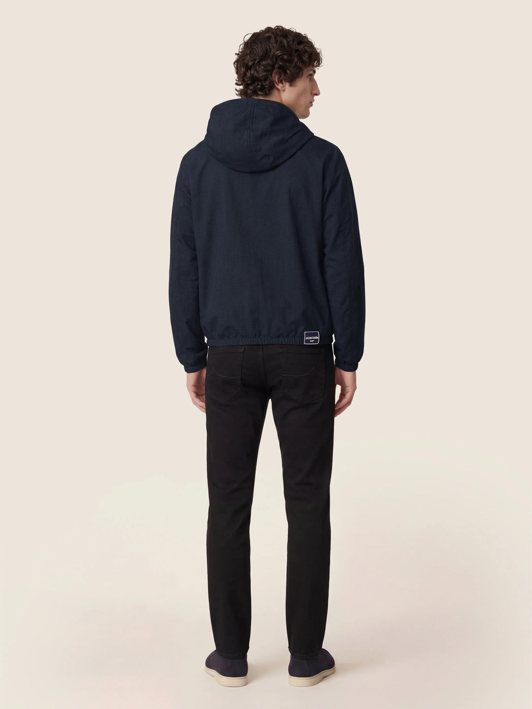Men's black slim five-pocket jeans with button and zip fly