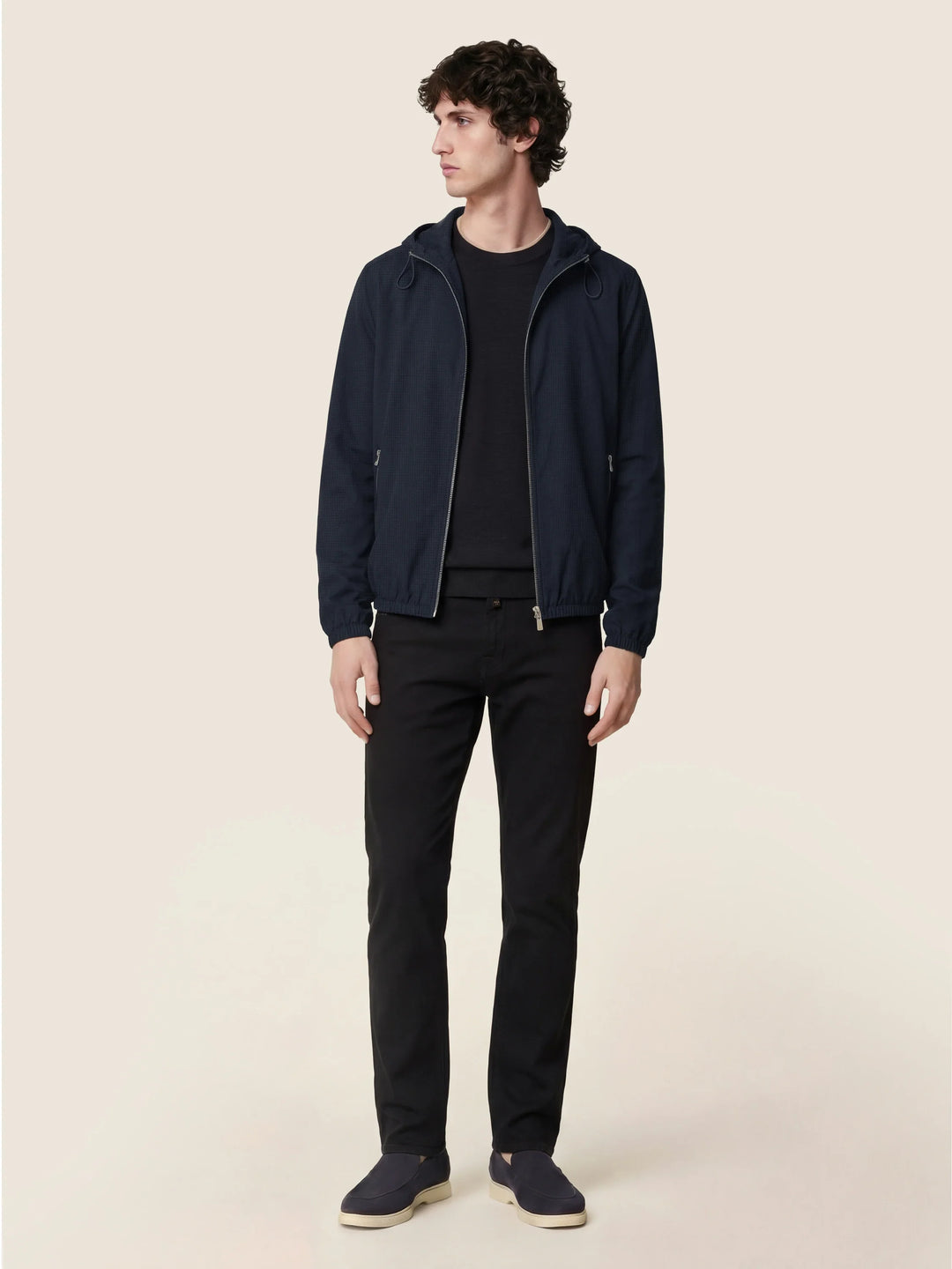 Men's black slim five-pocket jeans with button and zip fly