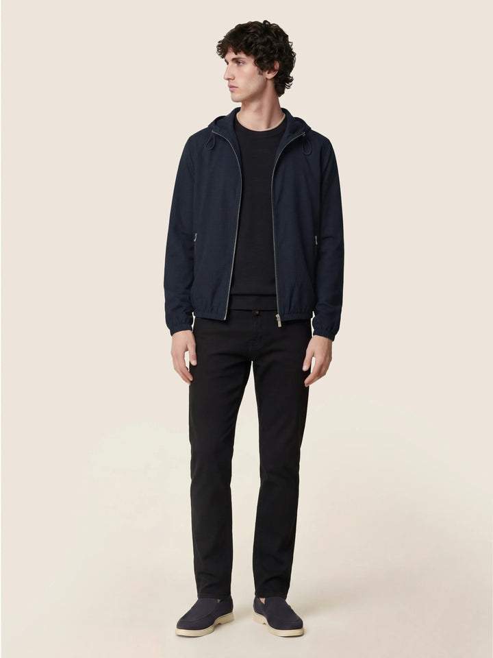 Men's black slim five-pocket jeans with button and zip fly