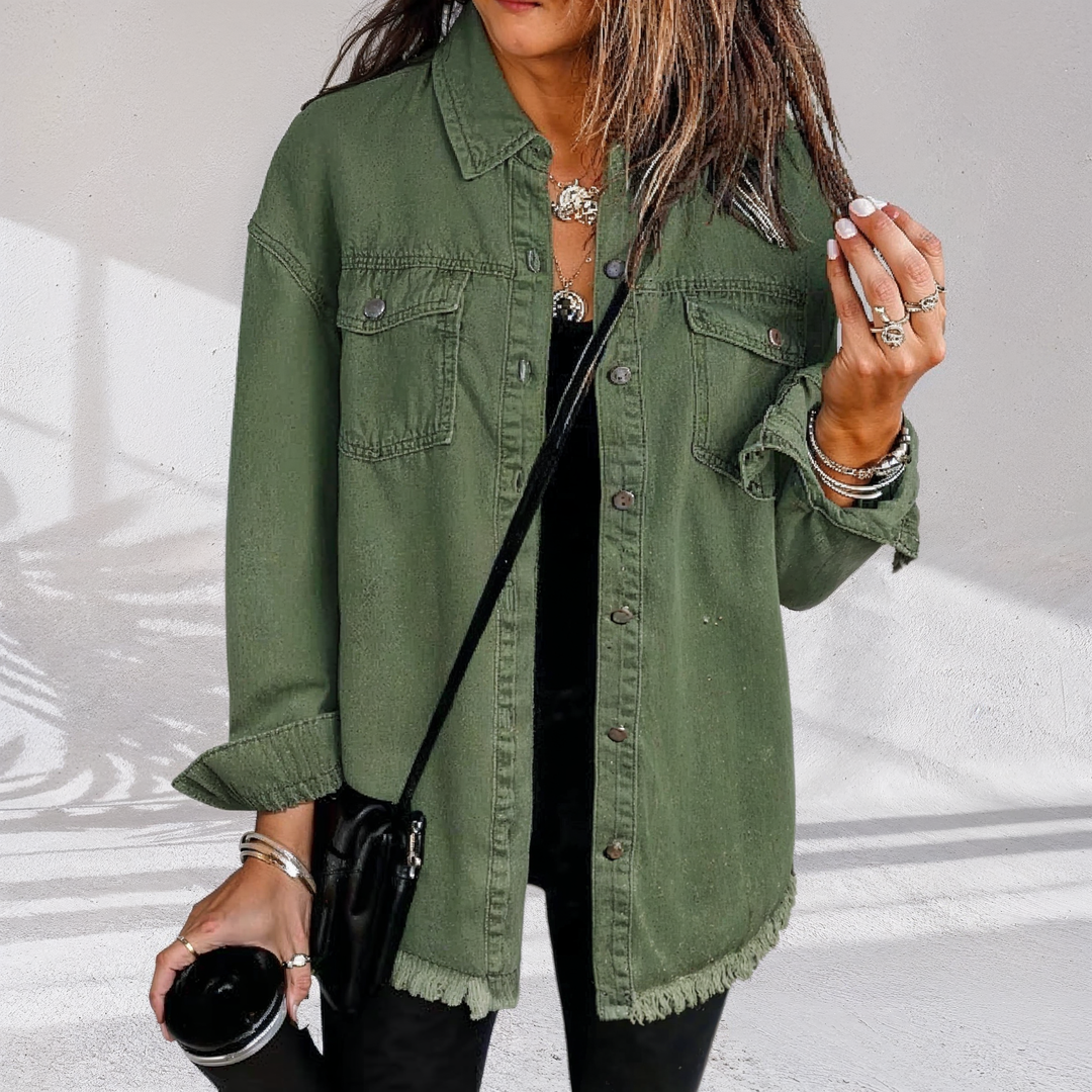Women's oversized denim jacket with chest pockets and frayed hem