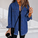 Women's oversized denim jacket with chest pockets and frayed hem