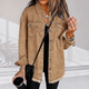 Women's oversized denim jacket with chest pockets and frayed hem