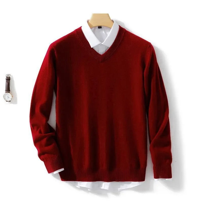 Men's long-sleeve V-neck sweater layered over a collared shirt