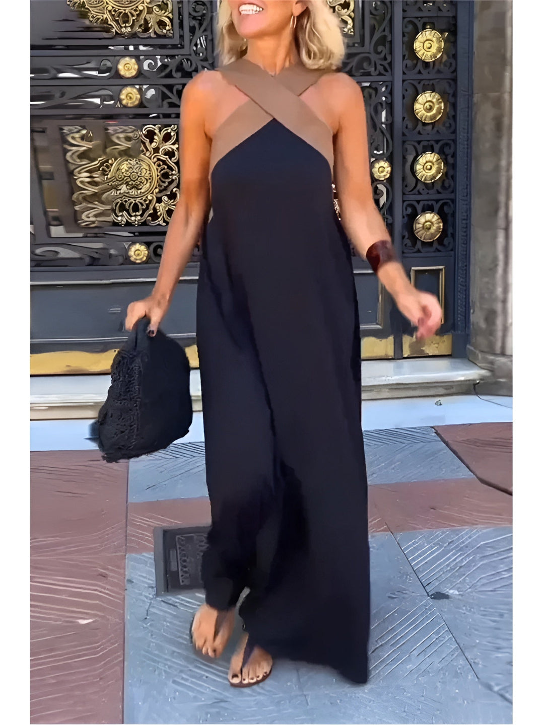 Women's sleeveless maxi dress with crossed halter neckline in black and white colourway
