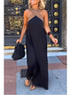 Women's sleeveless maxi dress with crossed halter neckline in black and white colourway