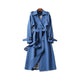 Women's long belted trench coat with double-breasted buttons and cuff buckles