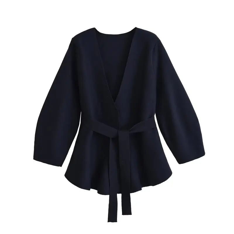 Women's long-sleeve wrap knit top with V-neckline and tie waist