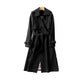 Women's long belted trench coat with double-breasted buttons and cuff buckles