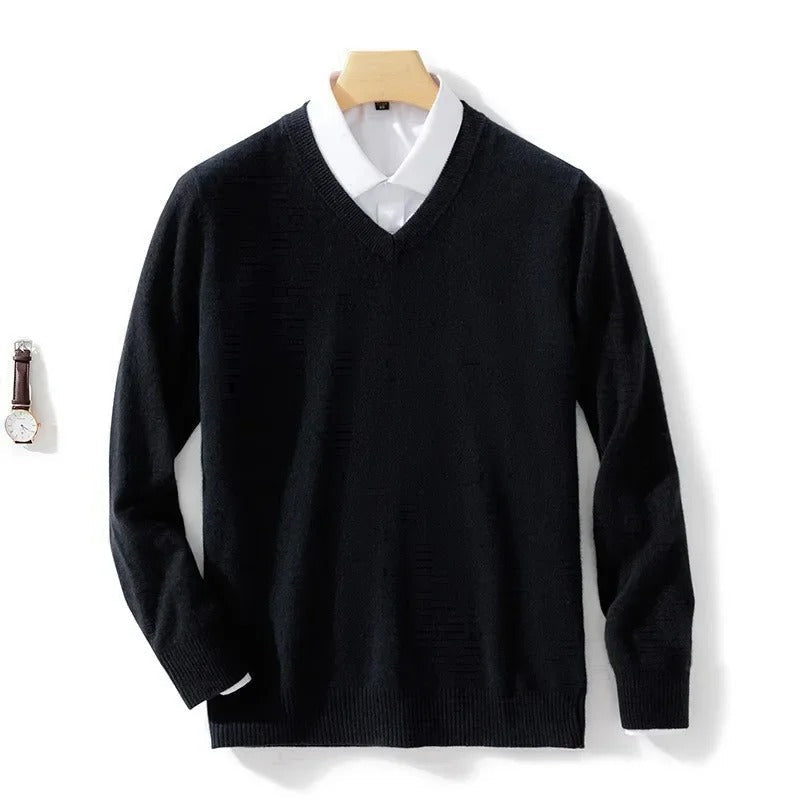 Men's long-sleeve V-neck sweater layered over a collared shirt