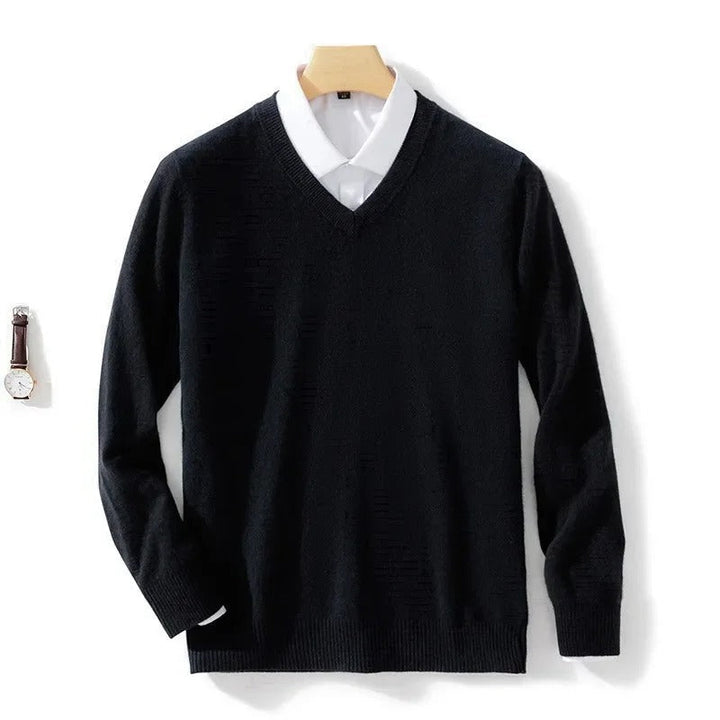 Men's long-sleeve V-neck sweater layered over a collared shirt