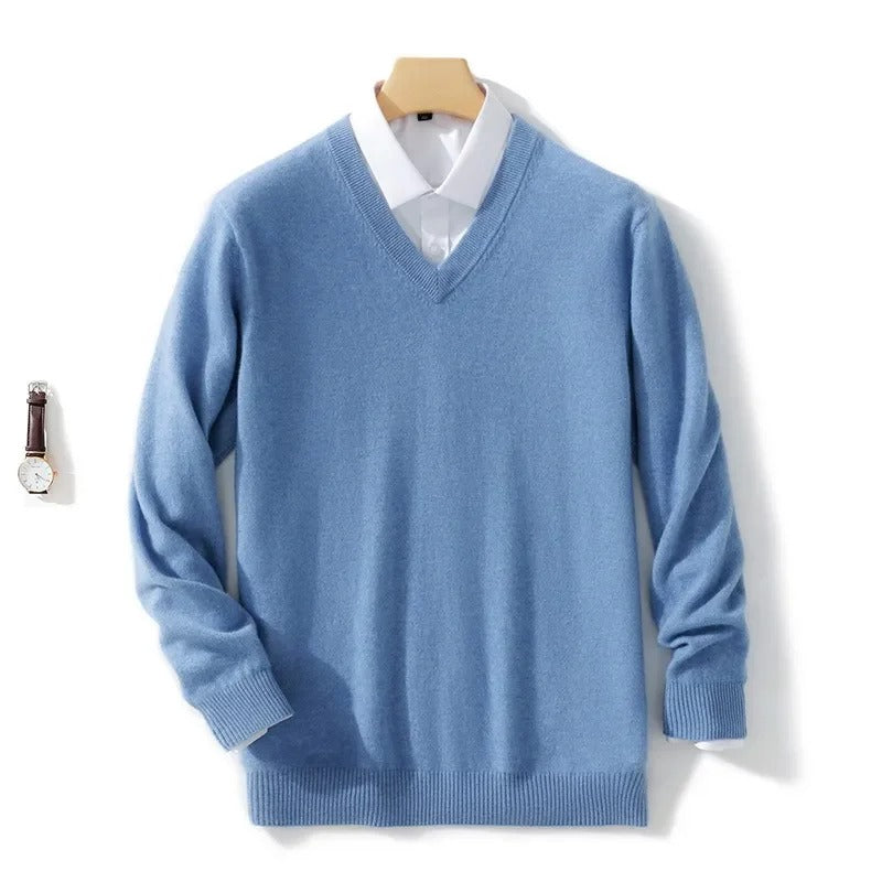 Men's long-sleeve V-neck sweater layered over a collared shirt