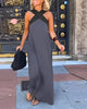 Women's sleeveless maxi dress with crossed halter neckline in black and white colourway