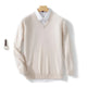 Men's long-sleeve V-neck sweater layered over a collared shirt