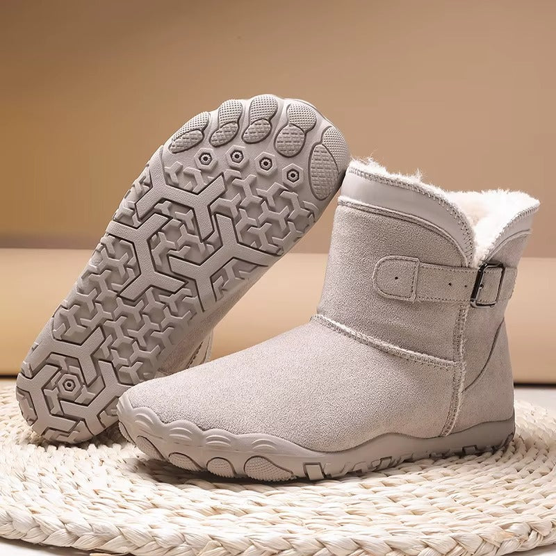 Winter ankle boots with buckle strap faux fur trim and treaded sole