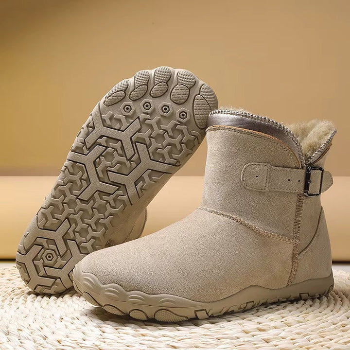 Winter ankle boots with buckle strap faux fur trim and treaded sole