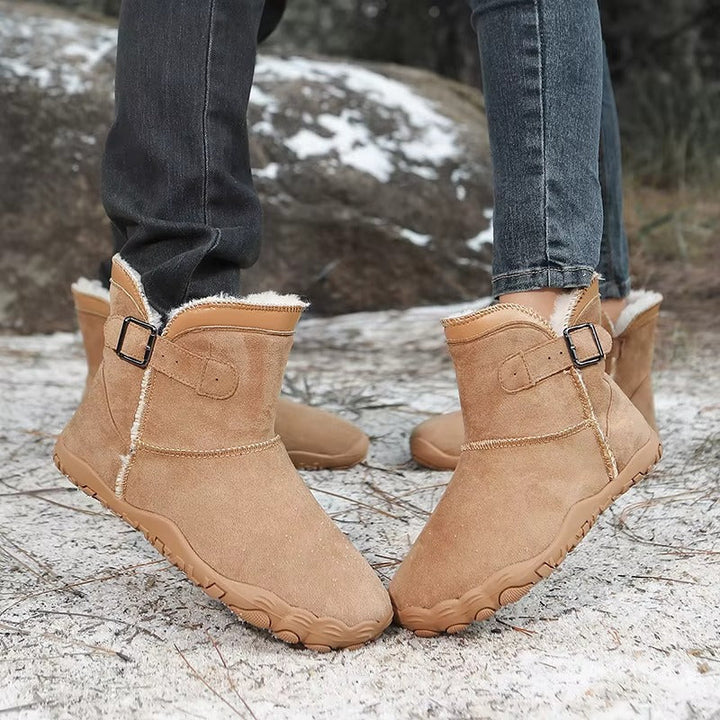 Winter ankle boots with buckle strap faux fur trim and treaded sole