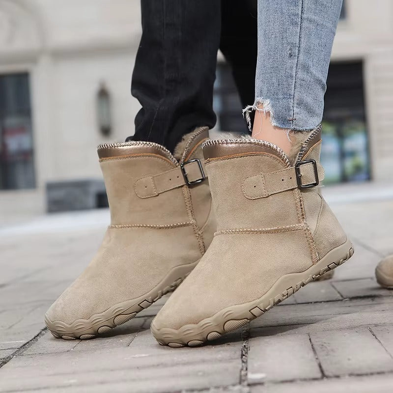 Winter ankle boots with buckle strap faux fur trim and treaded sole