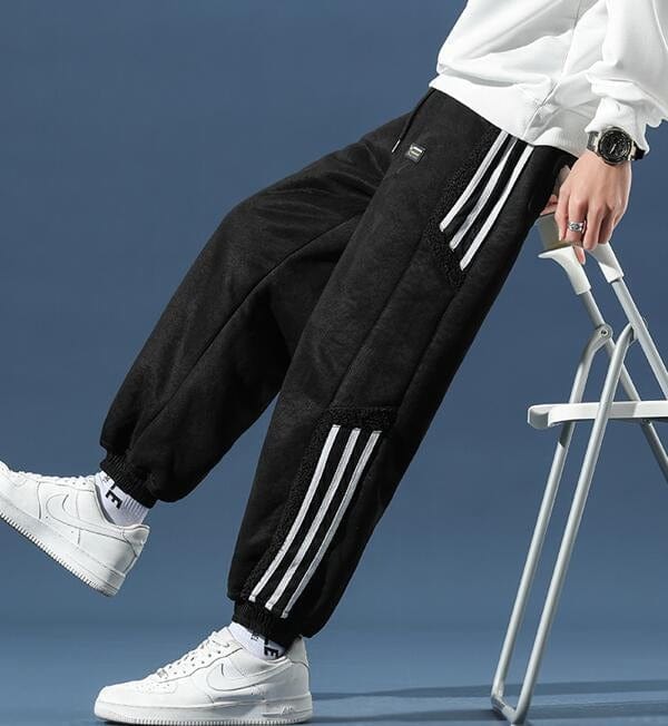 Fleece jogger pants with striped side panels and elasticated cuffs