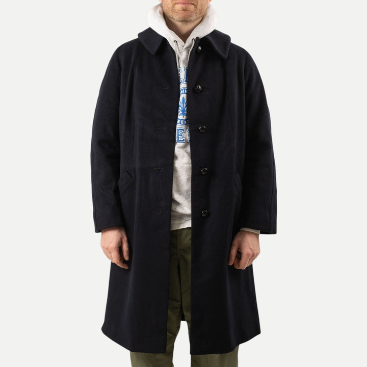 Men's navy long overcoat with point collar and button front