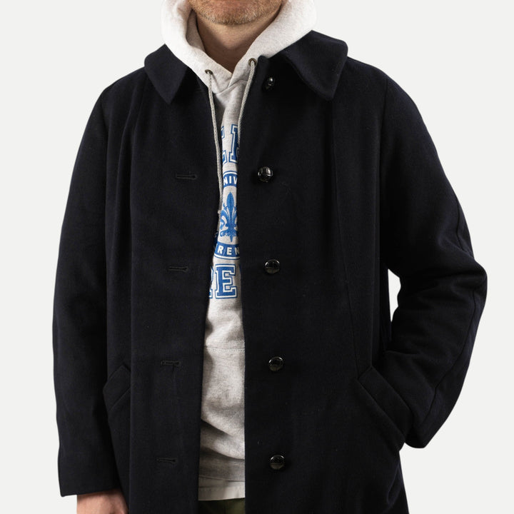 Men's navy long overcoat with point collar and button front