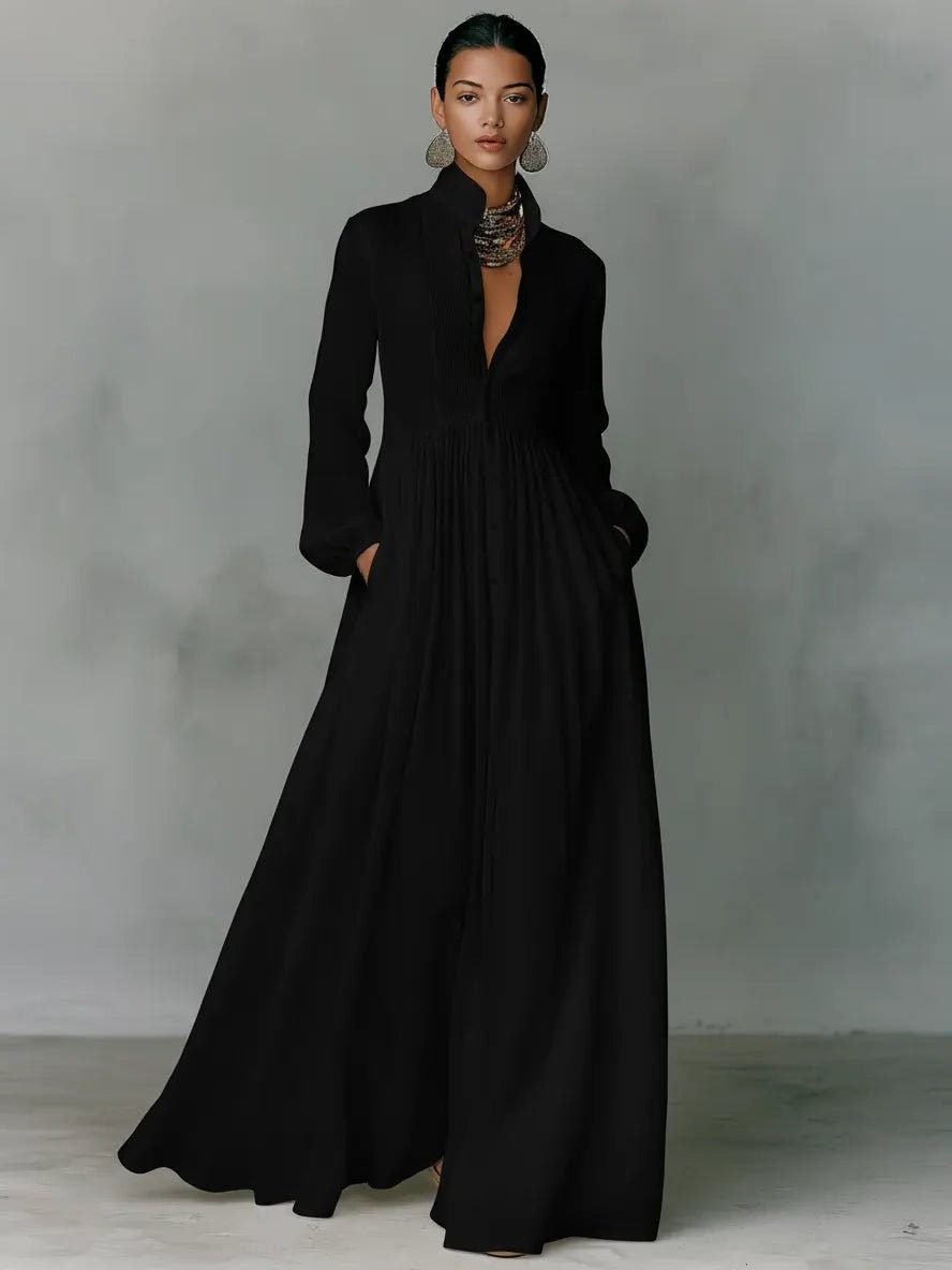 Women's maxi shirt dress with stand collar and long sleeves in white with pleated skirt