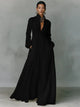 Women's maxi shirt dress with stand collar and long sleeves in white with pleated skirt