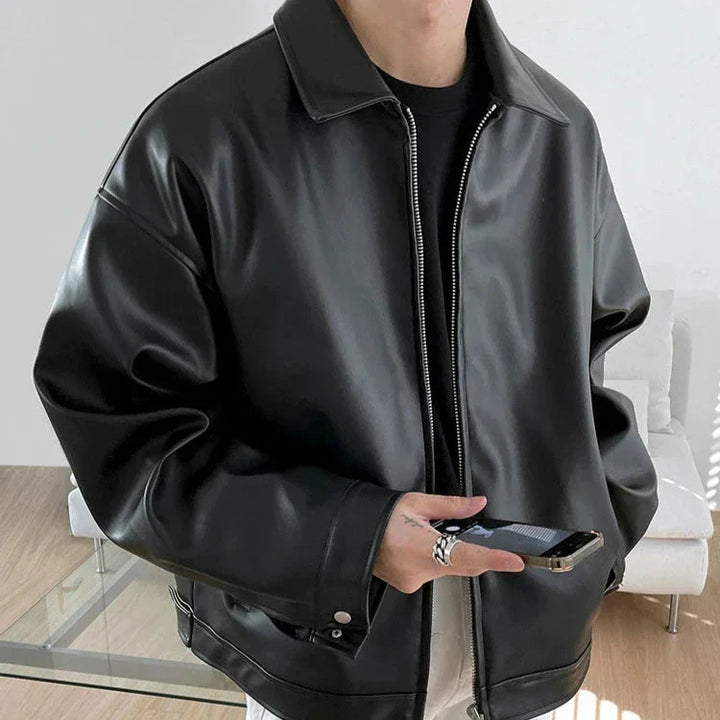 Men's black collared zip-front jacket with long sleeves and front pockets