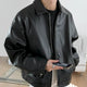 Men's black collared zip-front jacket with long sleeves and front pockets