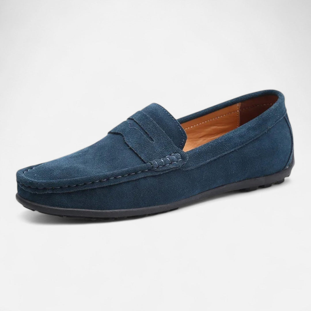 Men's slip-on penny loafer with moc toe stitching and flat sole