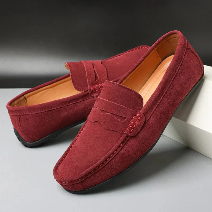 Men's slip-on penny loafers with rounded moc toes and flat soles