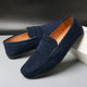 Men's slip-on penny loafers with rounded moc toes and flat soles