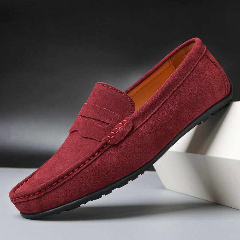 Men's slip-on penny loafers with rounded moc toes and flat soles