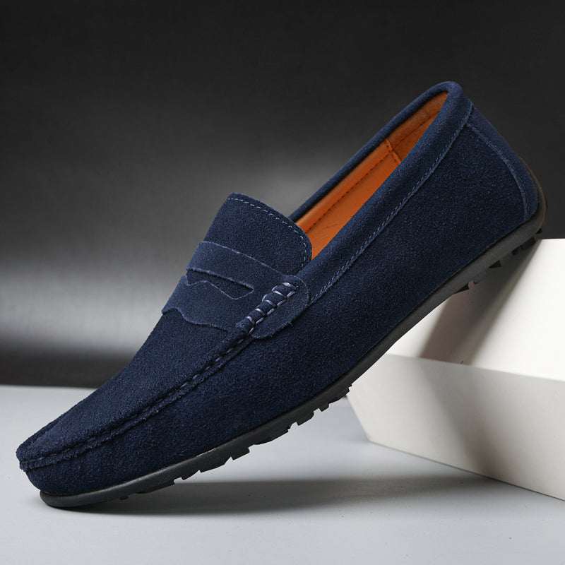 Men's slip-on penny loafers with rounded moc toes and flat soles