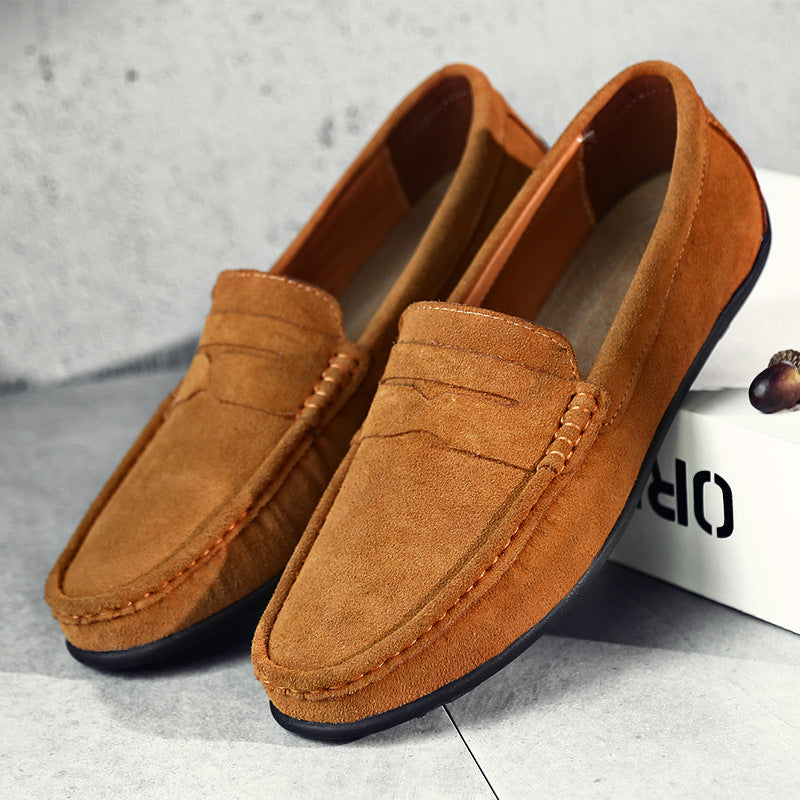 Men's slip-on penny loafers with rounded moc toes and flat soles