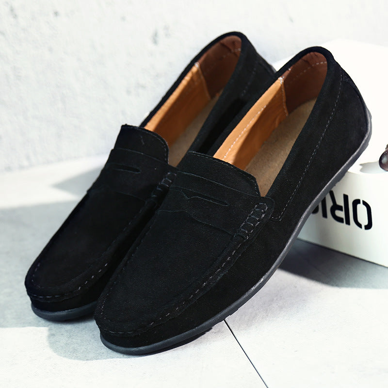 Men's slip-on penny loafers with rounded moc toes and flat soles