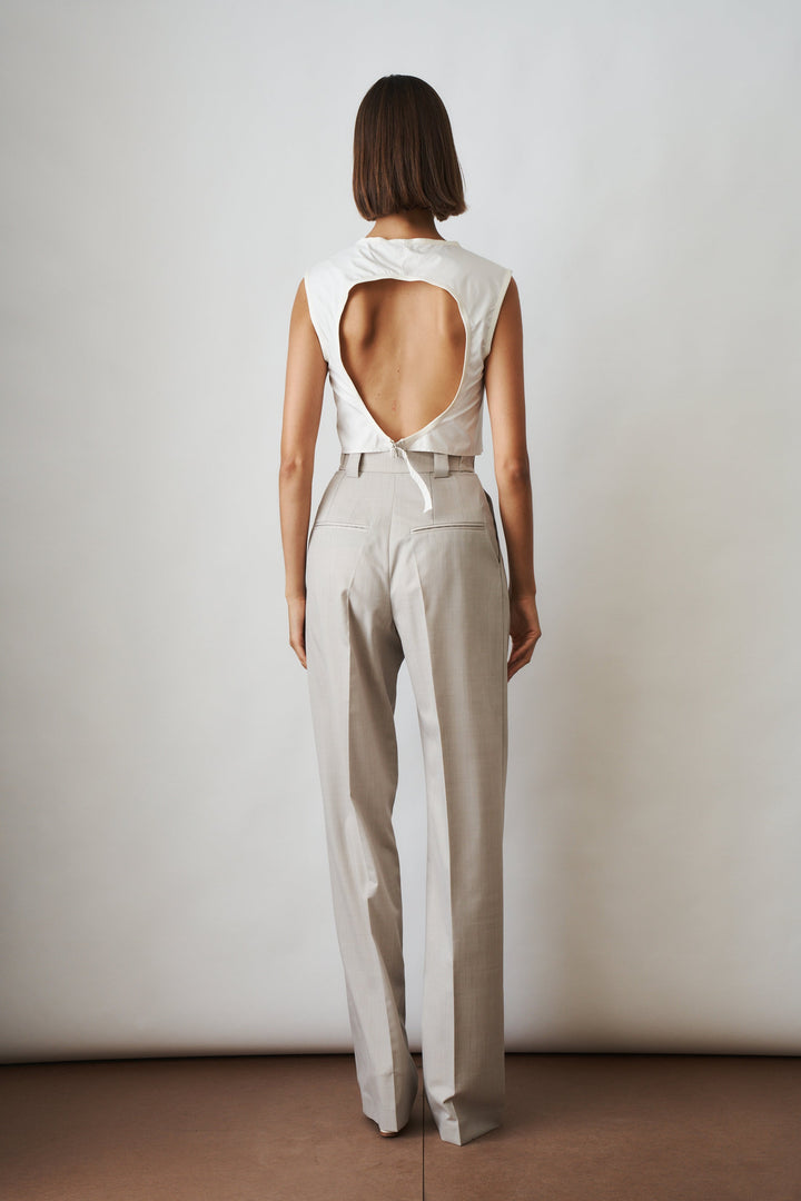 Women's beige high-rise wide-leg pants with front pleats and side pockets